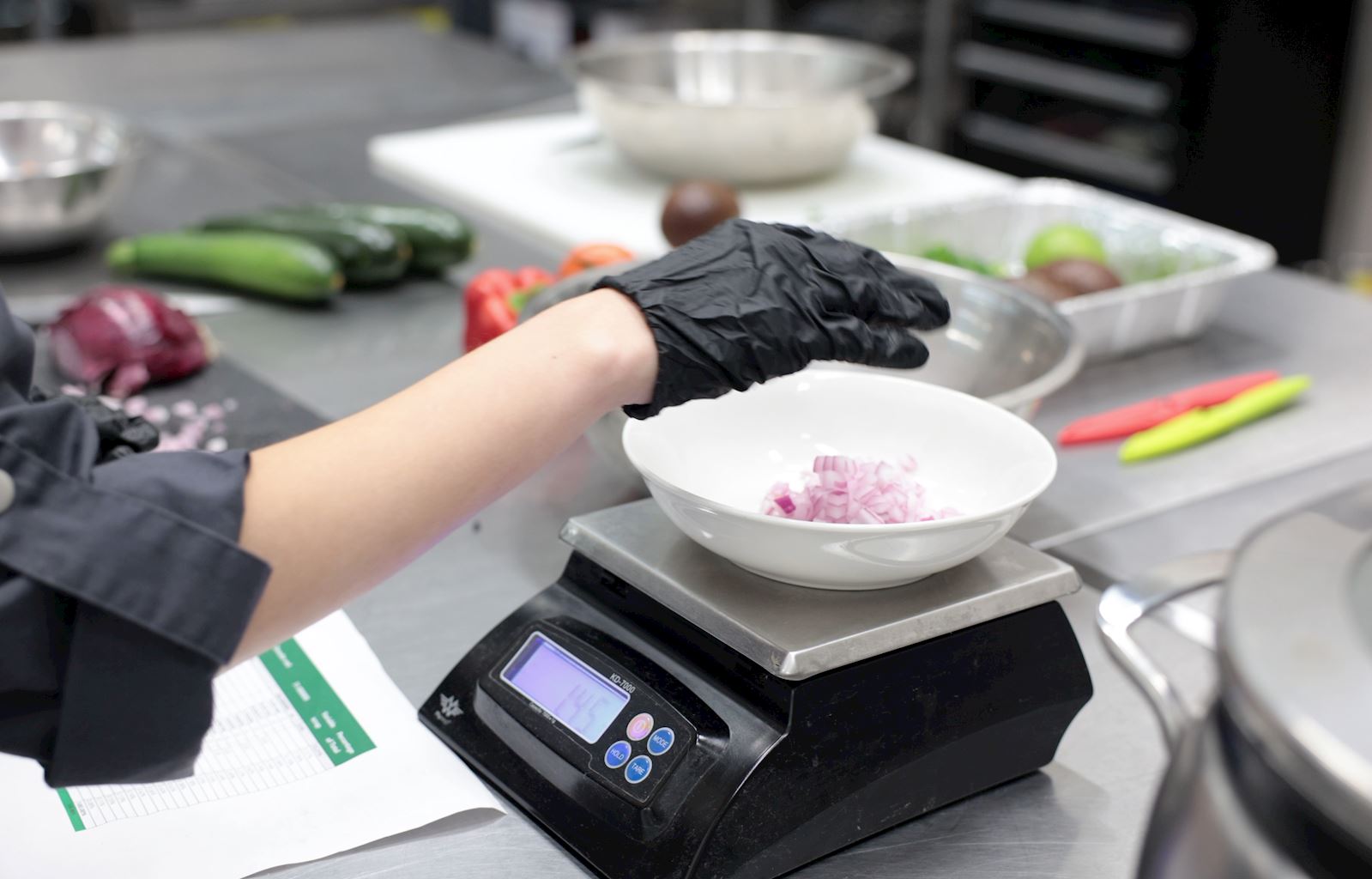 Mom's Meals Dietitian Weighing Food